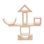 Cute structure which reminds a shape of robot from blocks of different shapes as arches, squares, triangles and etc